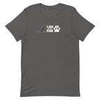 Law of the Paw® logo with seated dog and paw print on a t-shirt in asphalt, front view – Kate Spain design