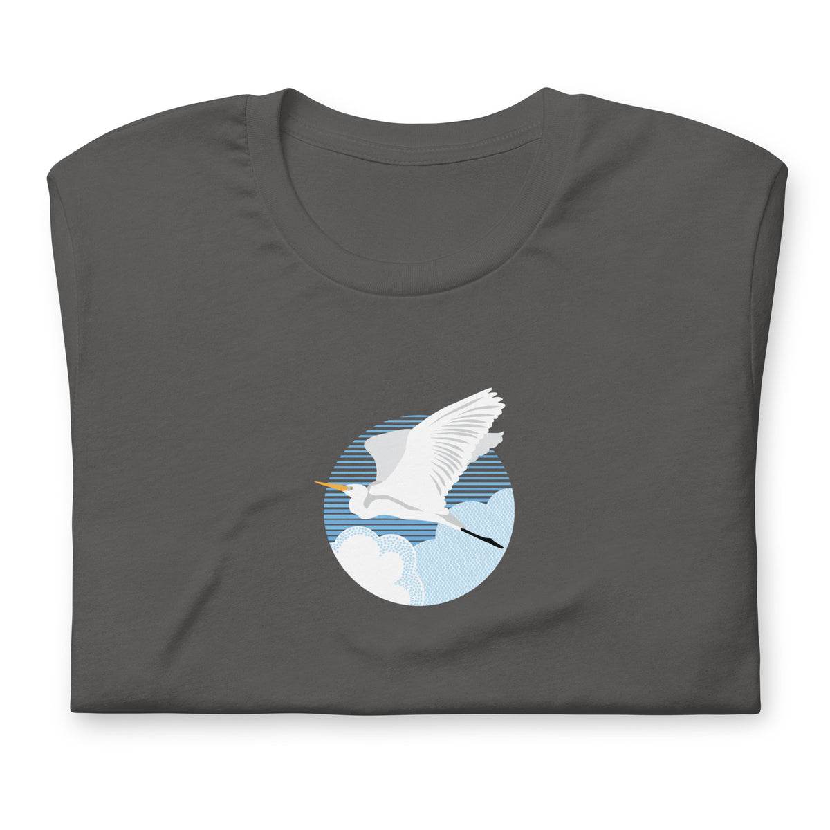 Great egret in flight against a blue circle on a t-shirt in asphalt, folded close-up of the design – Kate Spain design