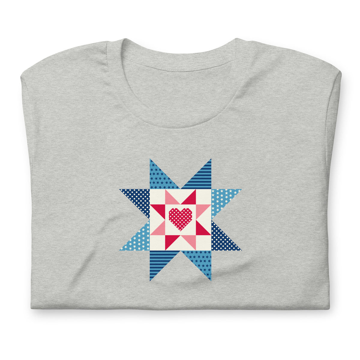 Liberty Love star quilt block with a heart in red, white and blue on a t-shirt in athletic heather grey, folded close-up of the design – Kate Spain design for Pat Sloan