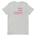 United We Quilt patchwork flag with quilt-block stars and heart stripes on a t-shirt in athletic heather grey, front view – Kate Spain design for Pat Sloan