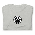Law of the Paw® dog paw print on a t-shirt in athletic heather grey, folded close-up of the design – Kate Spain design