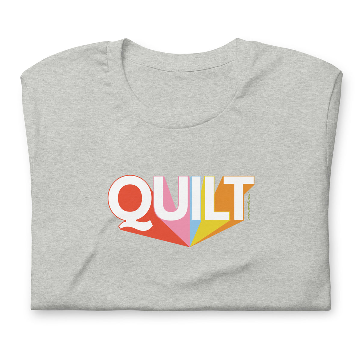 Moda QUILT logo with orange, pink, blue and yellow rays on a staple t-shirt in athletic heather grey, folded close-up of the design – Kate Spain design