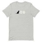 Law of the Paw® logo with seated dog and paw print on a t-shirt in athletic heather grey, front view – Kate Spain design