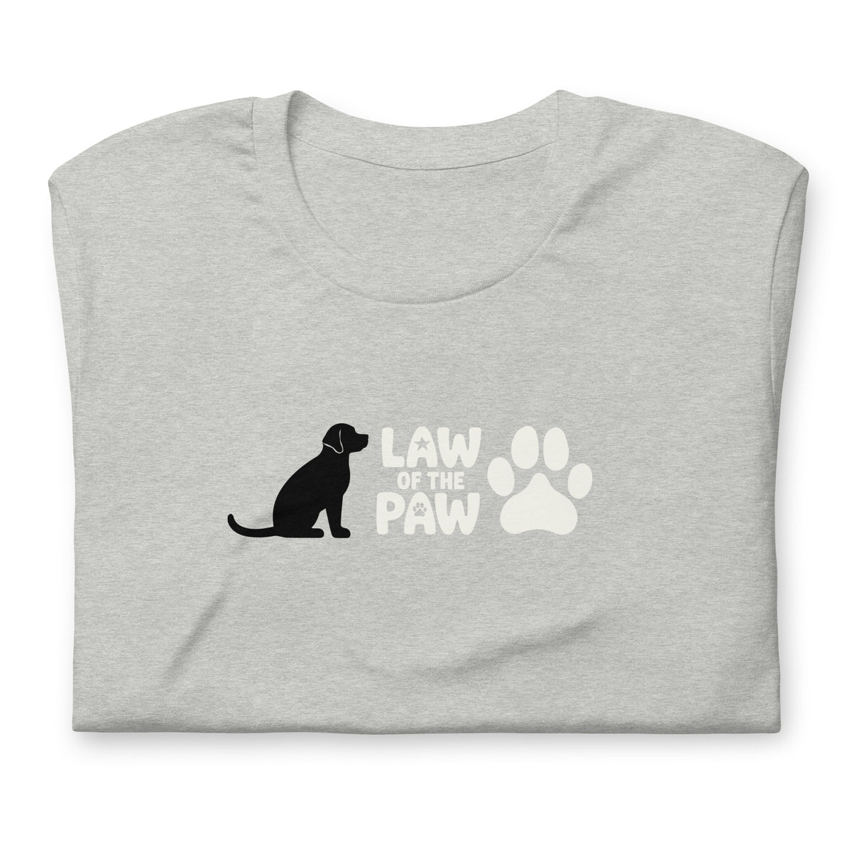 Law of the Paw® logo with seated dog and paw print on a t-shirt in athletic heather grey, folded close-up of the design – Kate Spain design