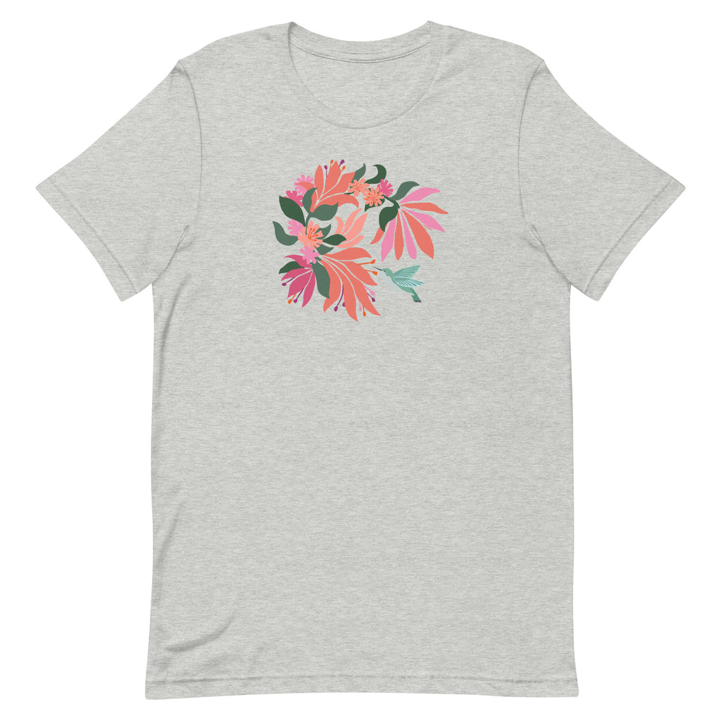 Hummingbird among coral tropical flowers on a t-shirt in athletic heather grey, front view – Kate Spain design