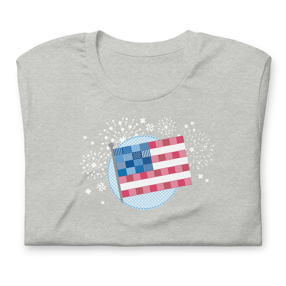 Patchwork Flag quilt-style flag with fireworks on a staple t-shirt in athletic heather grey, folded close-up of the design – Kate Spain design for Pat Sloan
