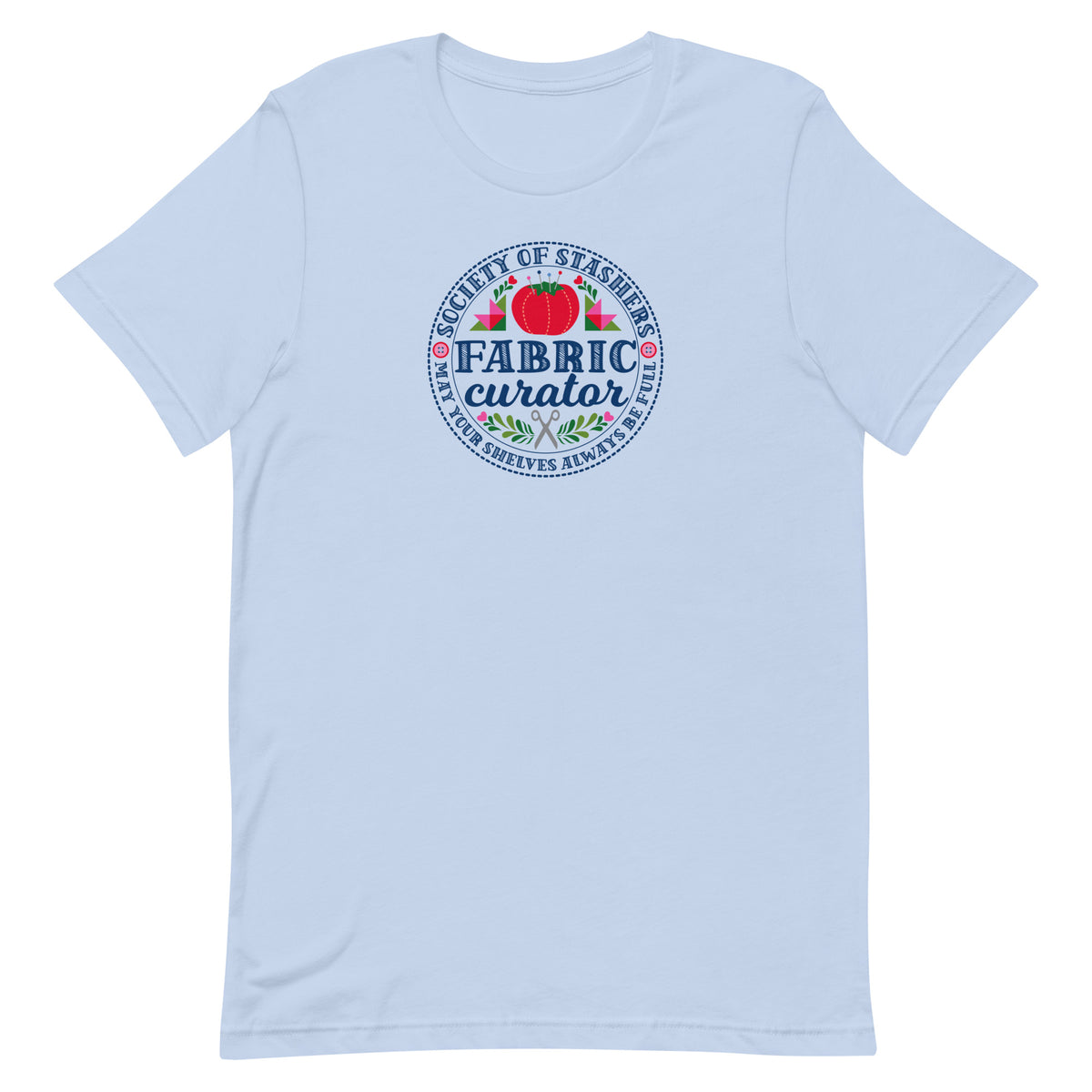 Fabric Curator Society of Stashers badge with a tomato pincushion on a t-shirt in light blue, front view – Kate Spain design for Pat Sloan