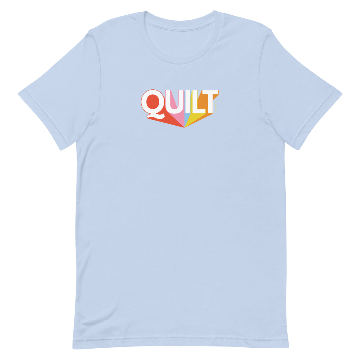 Moda QUILT logo with orange, pink, blue and yellow rays on a staple t-shirt in light blue, front view – Kate Spain design