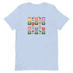 Birds + Blooms patchwork tulips and birds on a t-shirt in light blue, front view – Kate Spain design for Pat Sloan