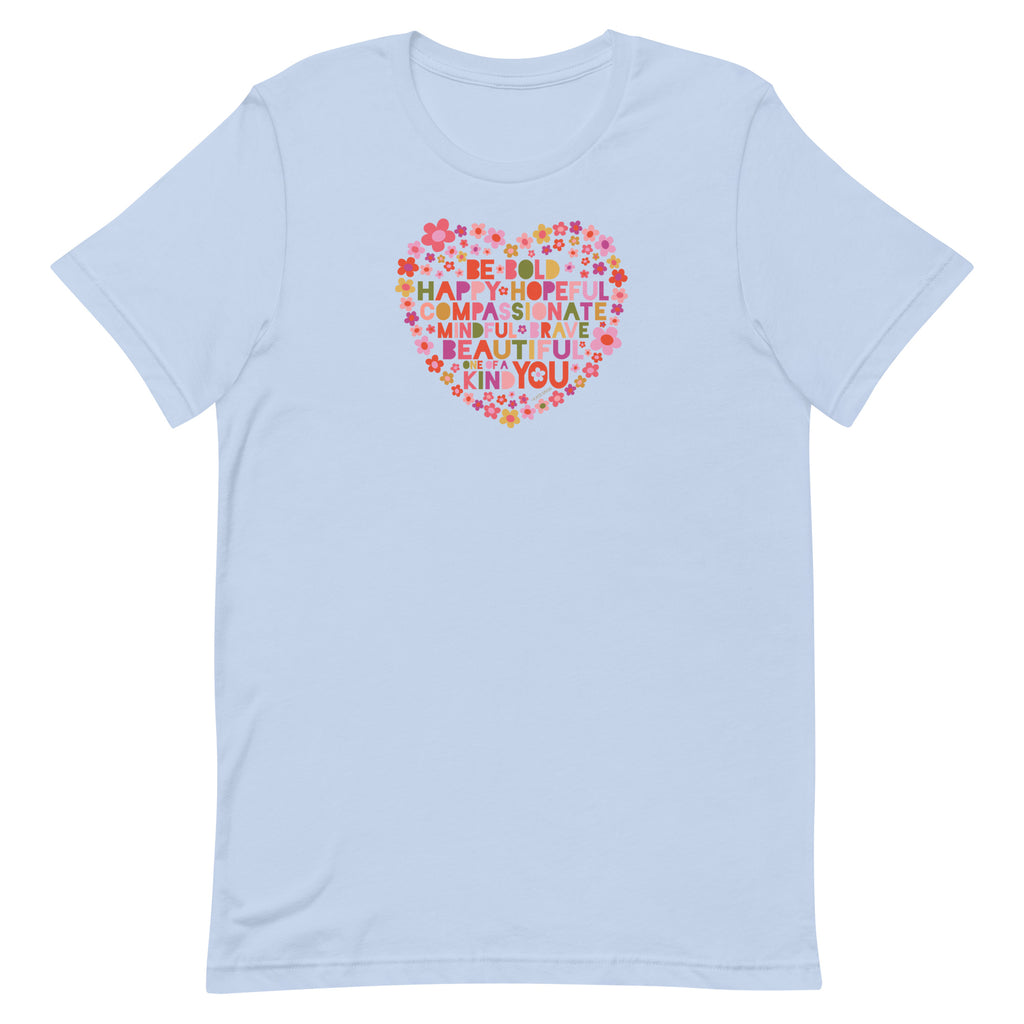 Be You floral heart of inspirational words on a staple t-shirt in baby blue, front view – Kate Spain design