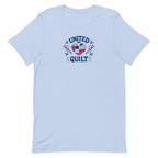 United We Quilt patchwork heart with quilt stars on a staple t-shirt in light blue, front view – Kate Spain design for Pat Sloan