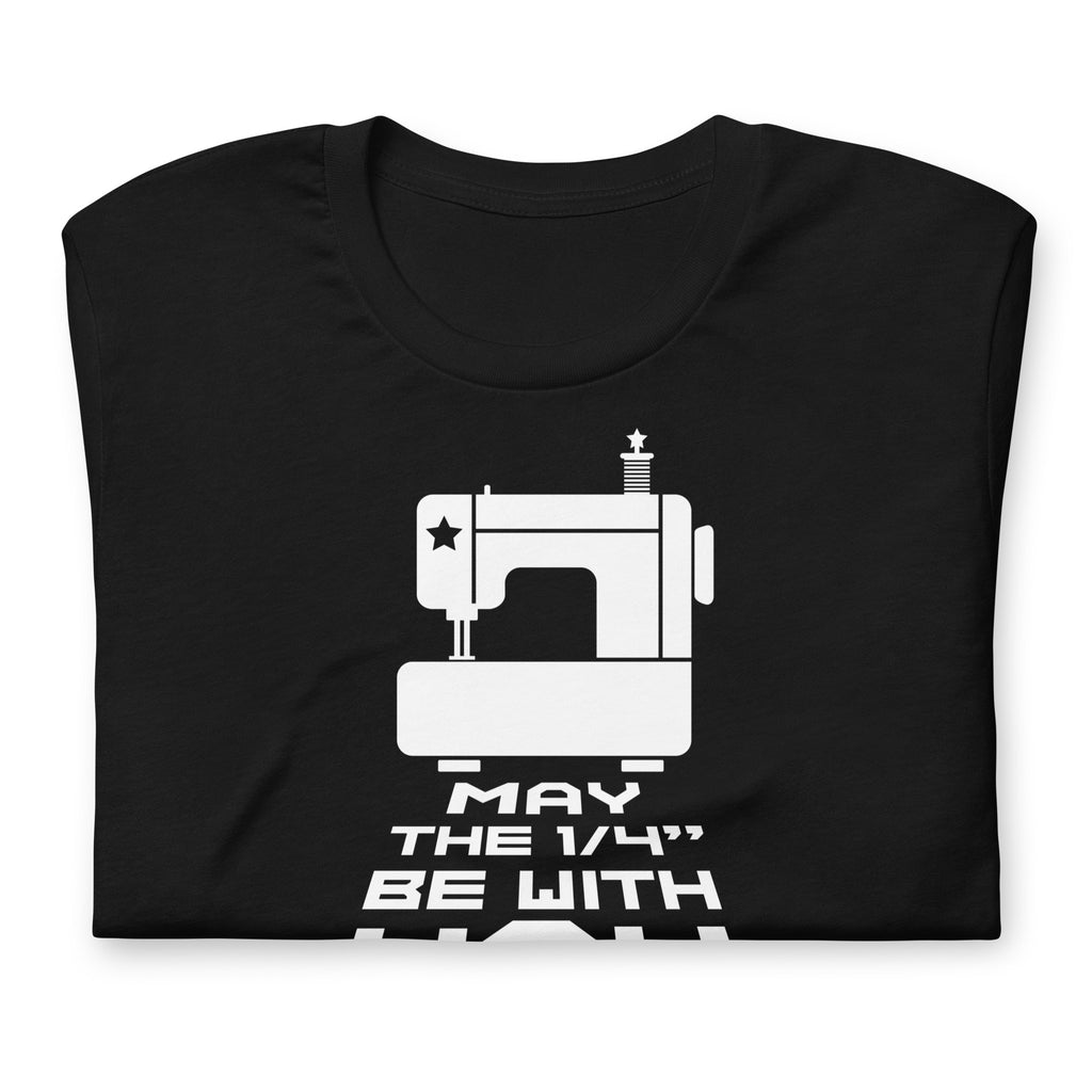 May the ¼" Be With You white sewing machine graphic on a staple t-shirt in black, folded close-up of the design – Kate Spain design for Pat Sloan