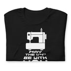 May the ¼" Be With You white sewing machine graphic on a staple t-shirt in black, folded close-up of the design – Kate Spain design for Pat Sloan