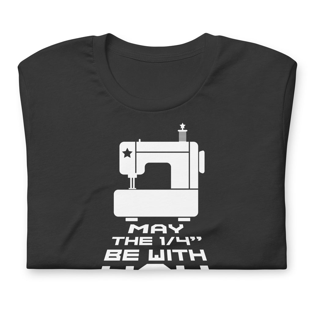 May the ¼" Be With You white sewing machine graphic on a staple t-shirt in dark grey, folded close-up of the design – Kate Spain design for Pat Sloan