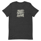 Needs Water + Sunlight hand lettering with leaf and sun accents on a t-shirt in dark grey heather, front view – Kate Spain design