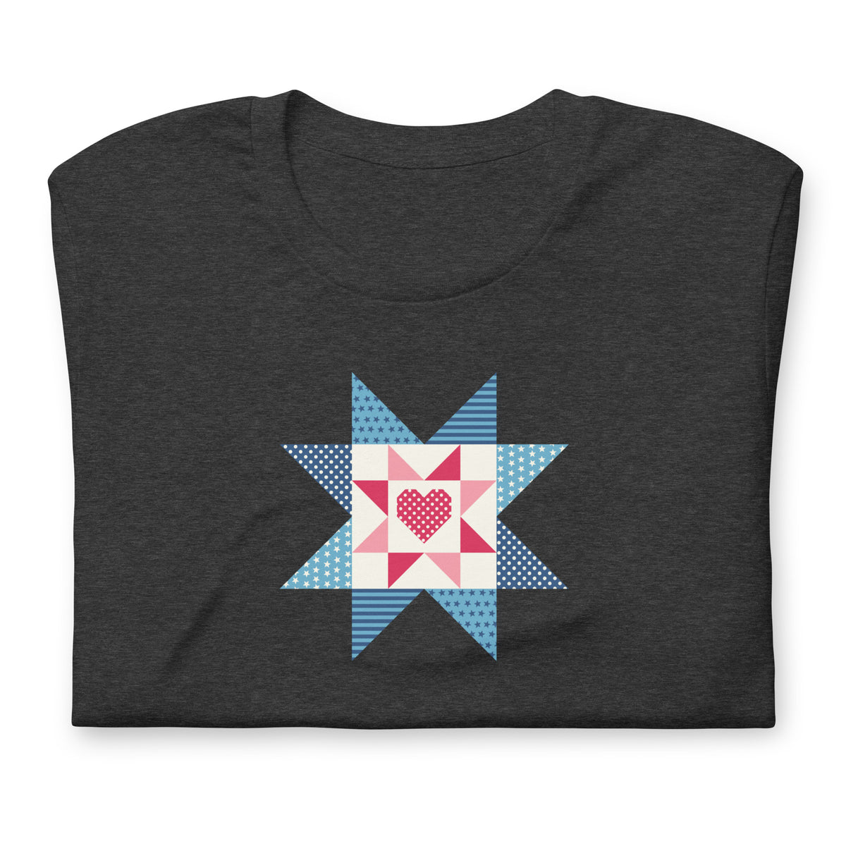 Liberty Love star quilt block with a heart in red, white and blue on a t-shirt in dark grey heather, folded close-up of the design – Kate Spain design for Pat Sloan