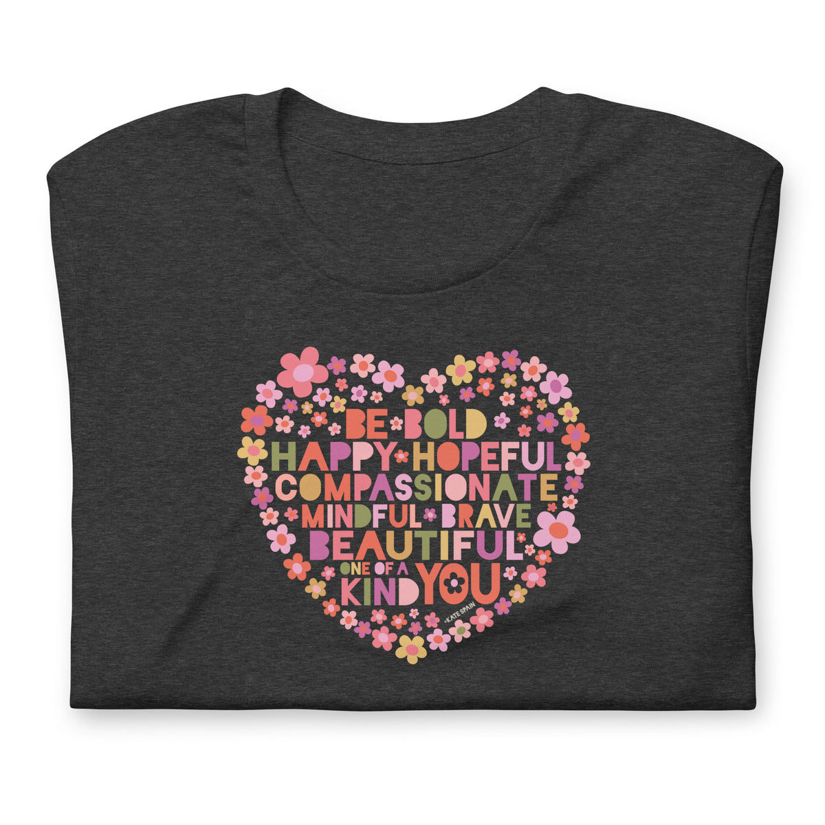 Be You floral heart of inspirational words on a staple t-shirt in dark grey heather, folded close-up of the design – Kate Spain design