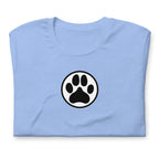 Law of the Paw® dog paw print on a t-shirt in heather Carolina blue, folded close-up of the design – Kate Spain design