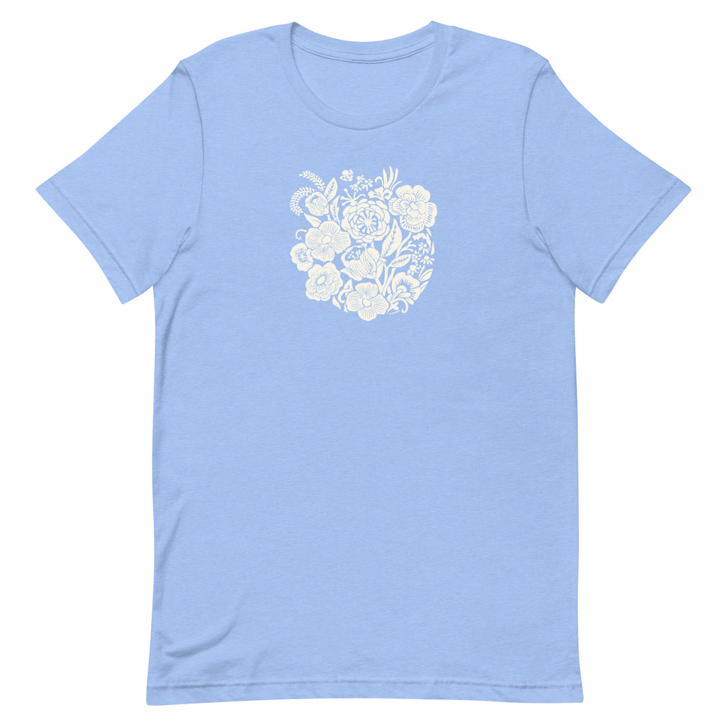 Meadowsweet woodblock-style bouquet of wildflowers on a t-shirt in heather Carolina blue, front view – Kate Spain design
