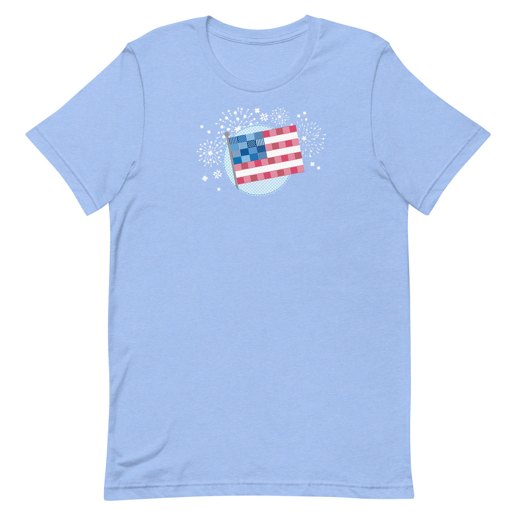 Patchwork Flag quilt-style flag with fireworks on a staple t-shirt in heather Carolina blue, front view – Kate Spain design for Pat Sloan
