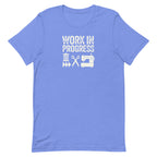 Work in Progress Mod distressed lettering with thread, scissors and sewing machine on a t-shirt in heather Columbia blue, front view – Kate Spain design for Pat Sloan