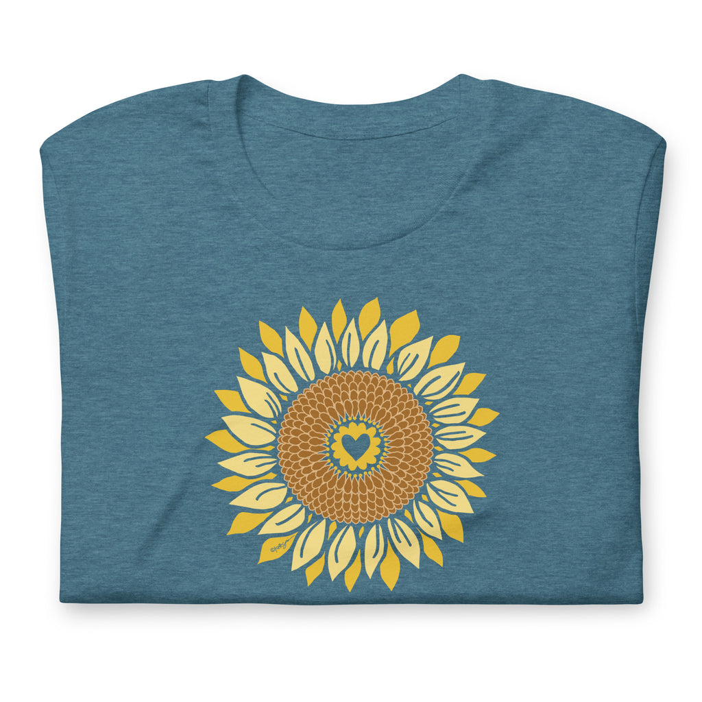 Golden sunflower with a heart center on a crewneck t-shirt in heather deep teal, folded close-up of the design – Sunflowers in My Heart by Kate Spain