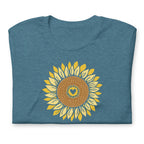 Golden sunflower with a heart center on a crewneck t-shirt in heather deep teal, folded close-up of the design – Sunflowers in My Heart by Kate Spain