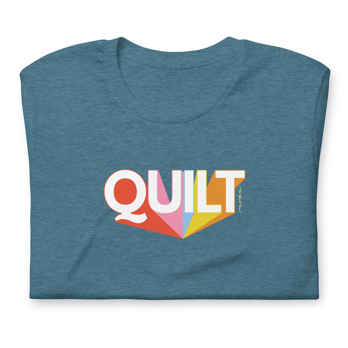 Moda QUILT logo with orange, pink, blue and yellow rays on a staple t-shirt in heather deep teal, folded close-up of the design – Kate Spain design
