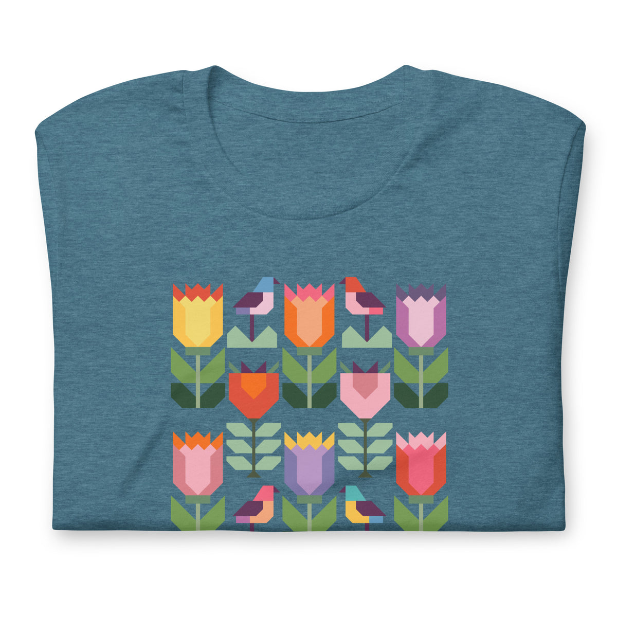 Birds + Blooms patchwork tulips and birds on a t-shirt in heather deep teal, folded close-up of the design – Kate Spain design for Pat Sloan