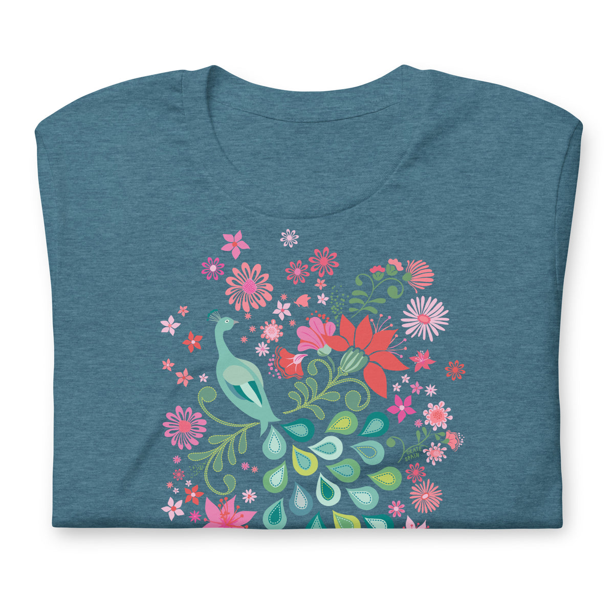 Peacock Flowers design, a peacock among coral, pink, mint and teal blooms on a t-shirt in heather deep teal, folded close-up of the design – Kate Spain design