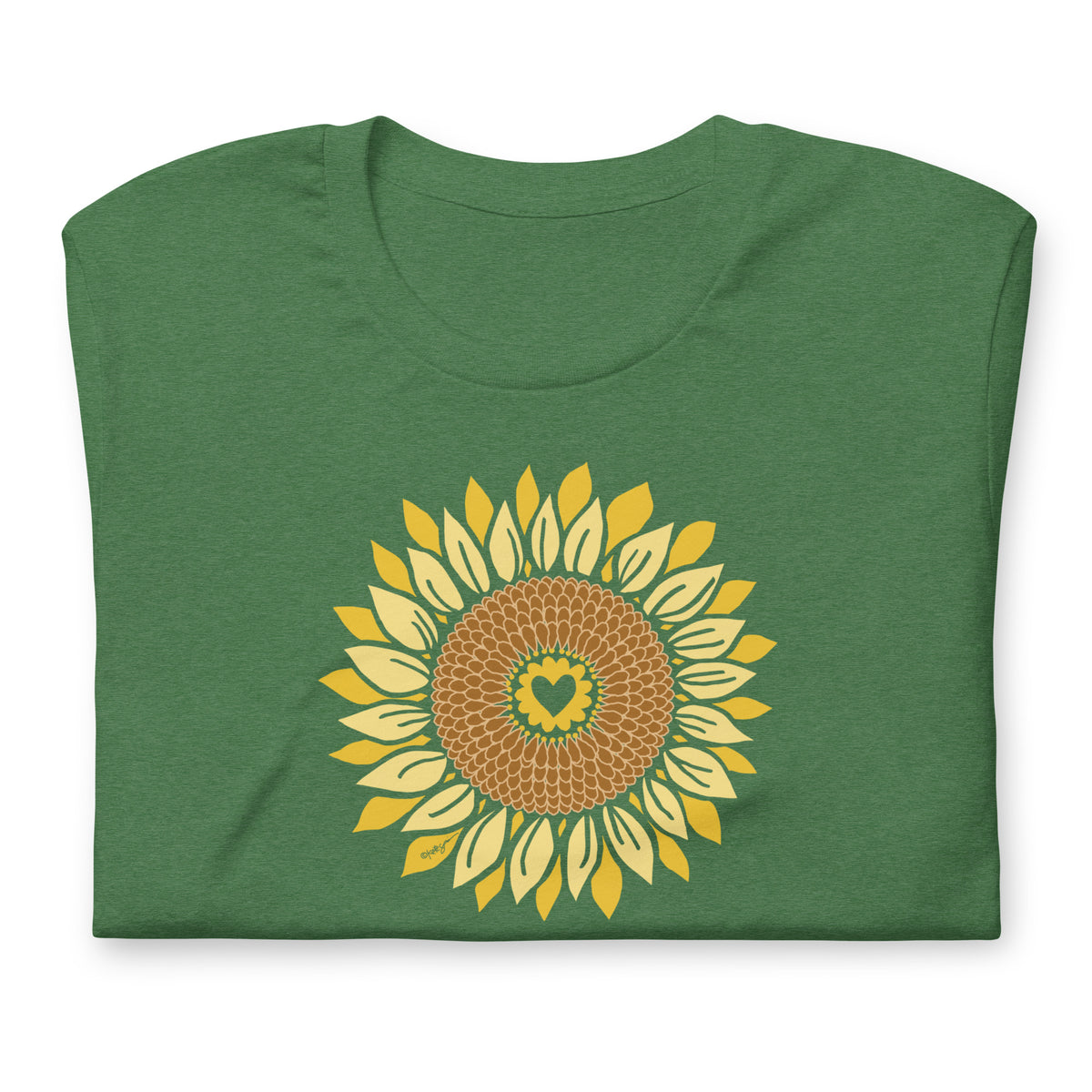Golden sunflower with a heart center on a crewneck t-shirt in heather grass green, folded close-up of the design – Sunflowers in My Heart by Kate Spain