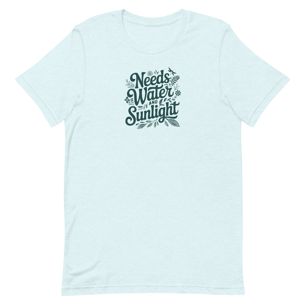 Needs Water + Sunlight hand lettering with leaf and sun accents on a t-shirt in heather ice blue, front view – Kate Spain design