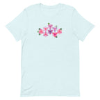 Pink GeoFlora hexagon flowers in pinks, mauves and sage on a t-shirt in heather ice blue, front view – Kate Spain design for Pat Sloan