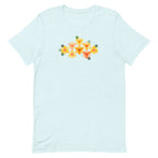 Yellow GeoFlora hexagon flowers in golden yellow, orange, coral and sage on a t-shirt in heather ice blue, front view – Kate Spain design for Pat Sloan