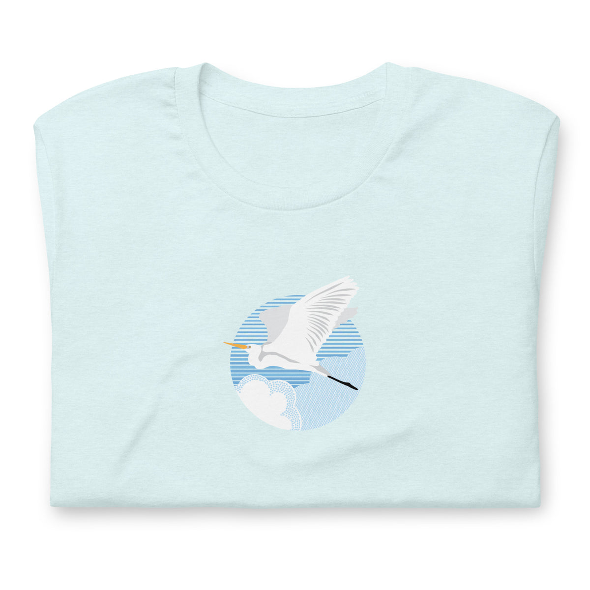 Great egret in flight against a blue circle on a t-shirt in heather ice blue, folded close-up of the design – Kate Spain design