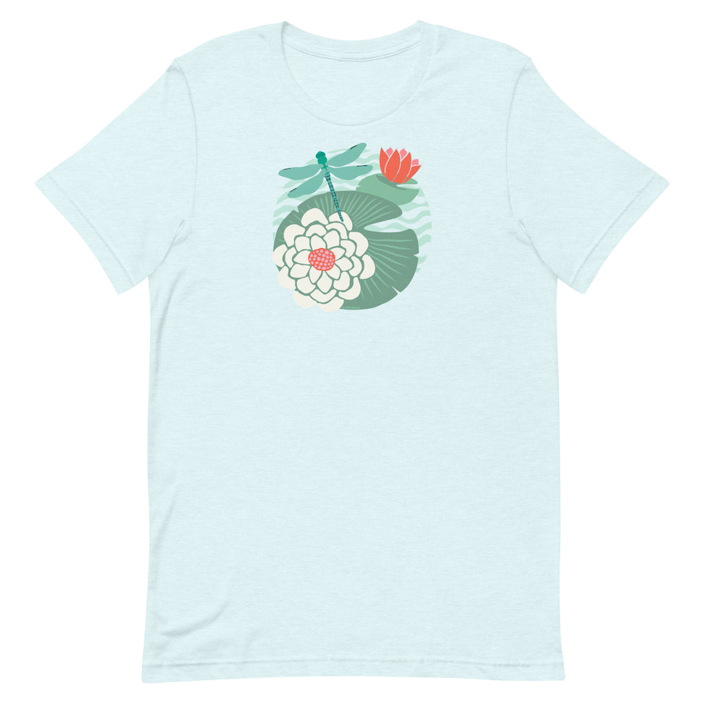Dragonfly over water lilies and lily pads on a t-shirt in heather ice blue, front view – Kate Spain design