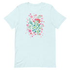 Peacock Flowers design, a peacock among coral, pink, mint and teal blooms on a t-shirt in heather ice blue, front view – Kate Spain design