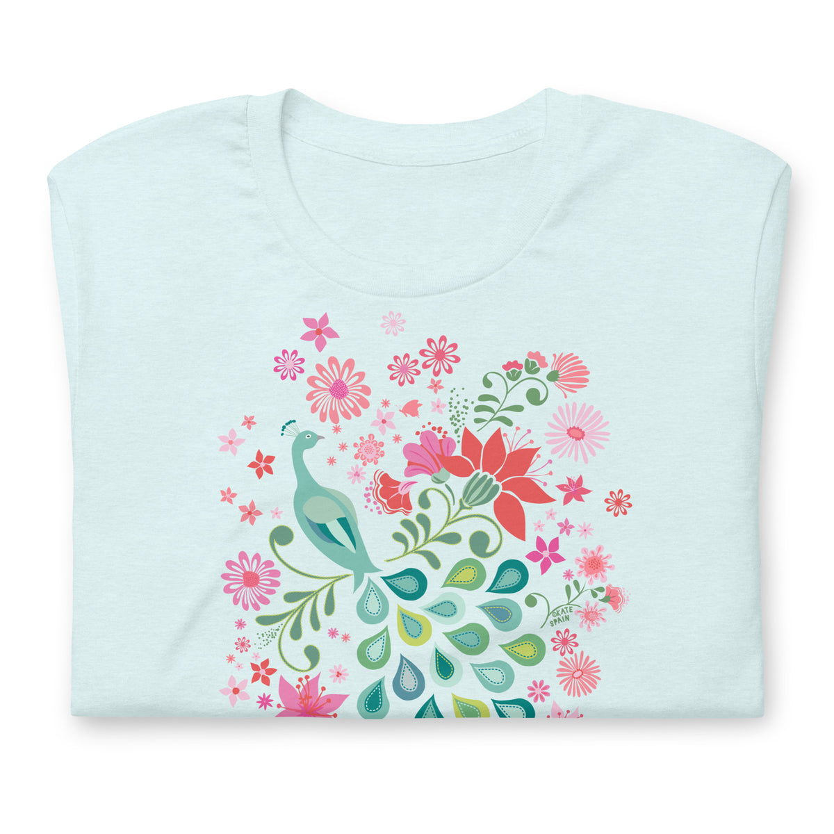 Peacock Flowers design, a peacock among coral, pink, mint and teal blooms on a t-shirt in heather ice blue, folded close-up of the design – Kate Spain design