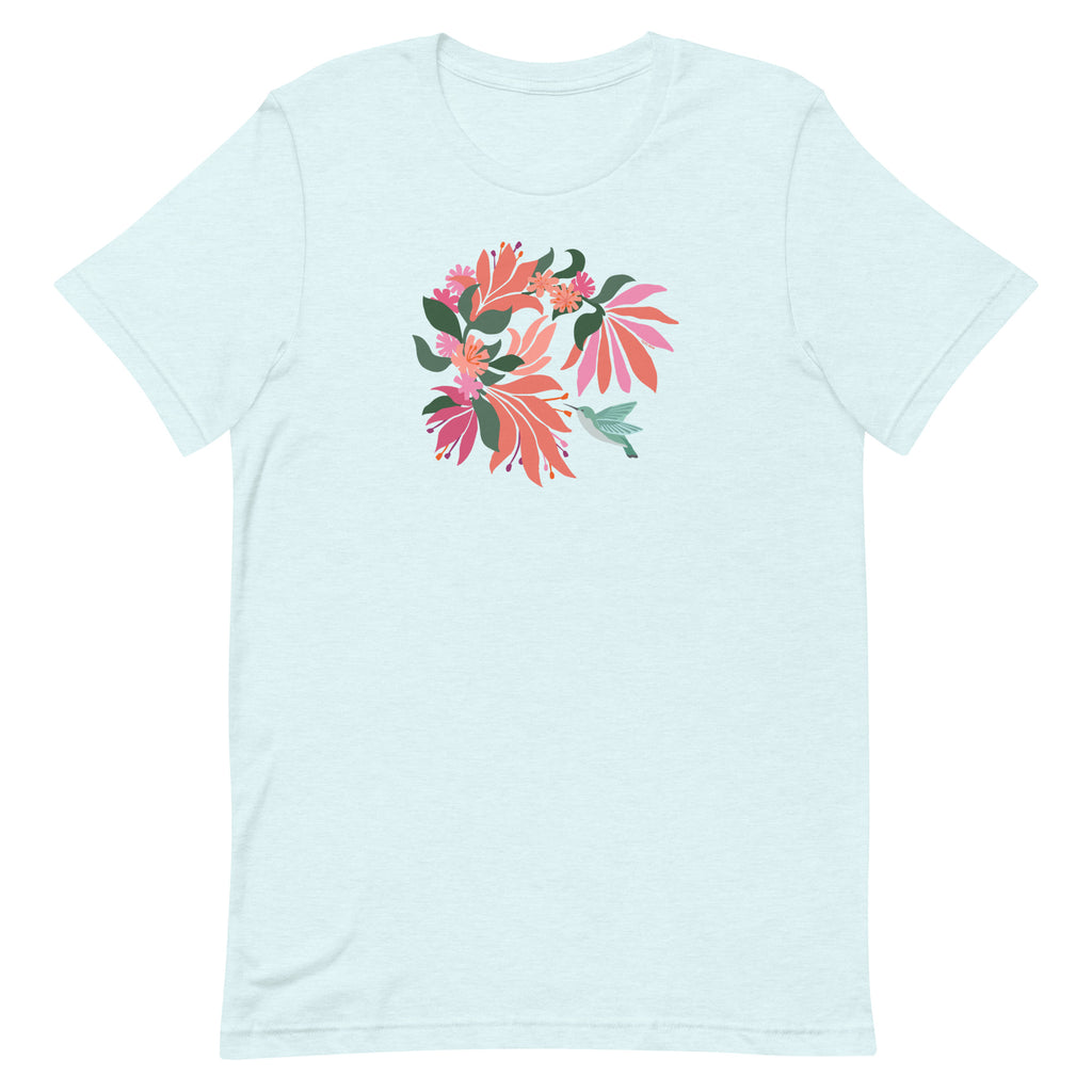 Hummingbird among coral tropical flowers on a t-shirt in heather ice blue, front view – Kate Spain design