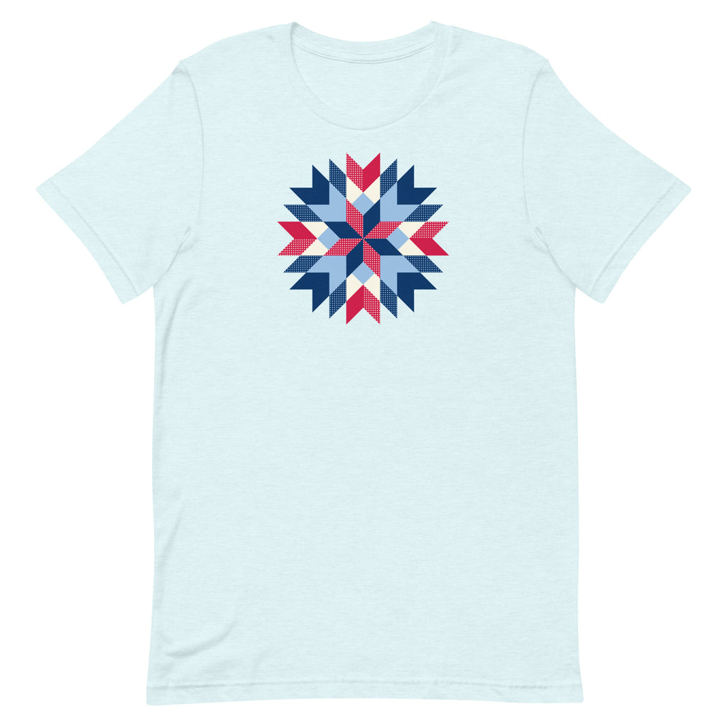 Barn Star quilt block in red, white and blue on a staple t-shirt in heather ice blue, front view – Kate Spain design for Pat Sloan
