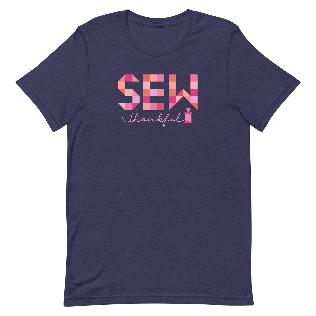 Sew Thankful patchwork lettering with a heart-topped thread spool on a t-shirt in heather navy, front view – Kate Spain design for Pat Sloan