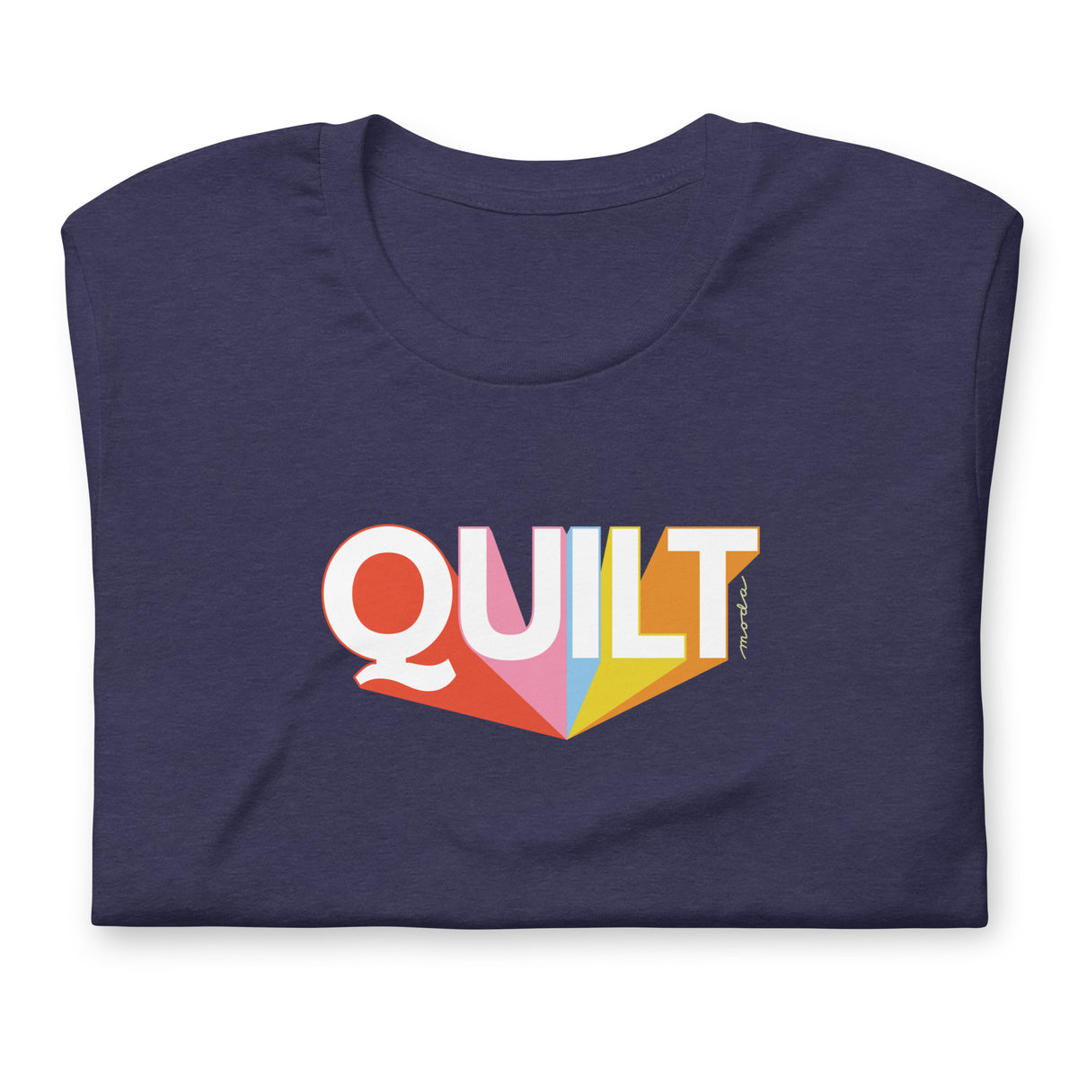 Moda QUILT logo with orange, pink, blue and yellow rays on a staple t-shirt in heather navy, folded close-up of the design – Kate Spain design