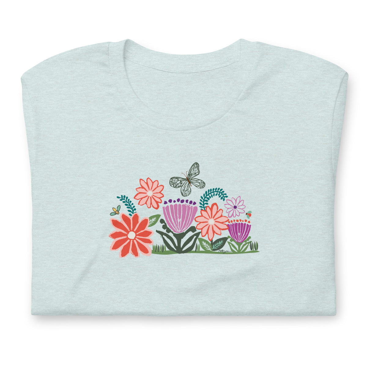 Bloom woodblock-style flowers with a butterfly, ladybug and bee on a t-shirt in heather prism ice blue, folded close-up of the design – Kate Spain design