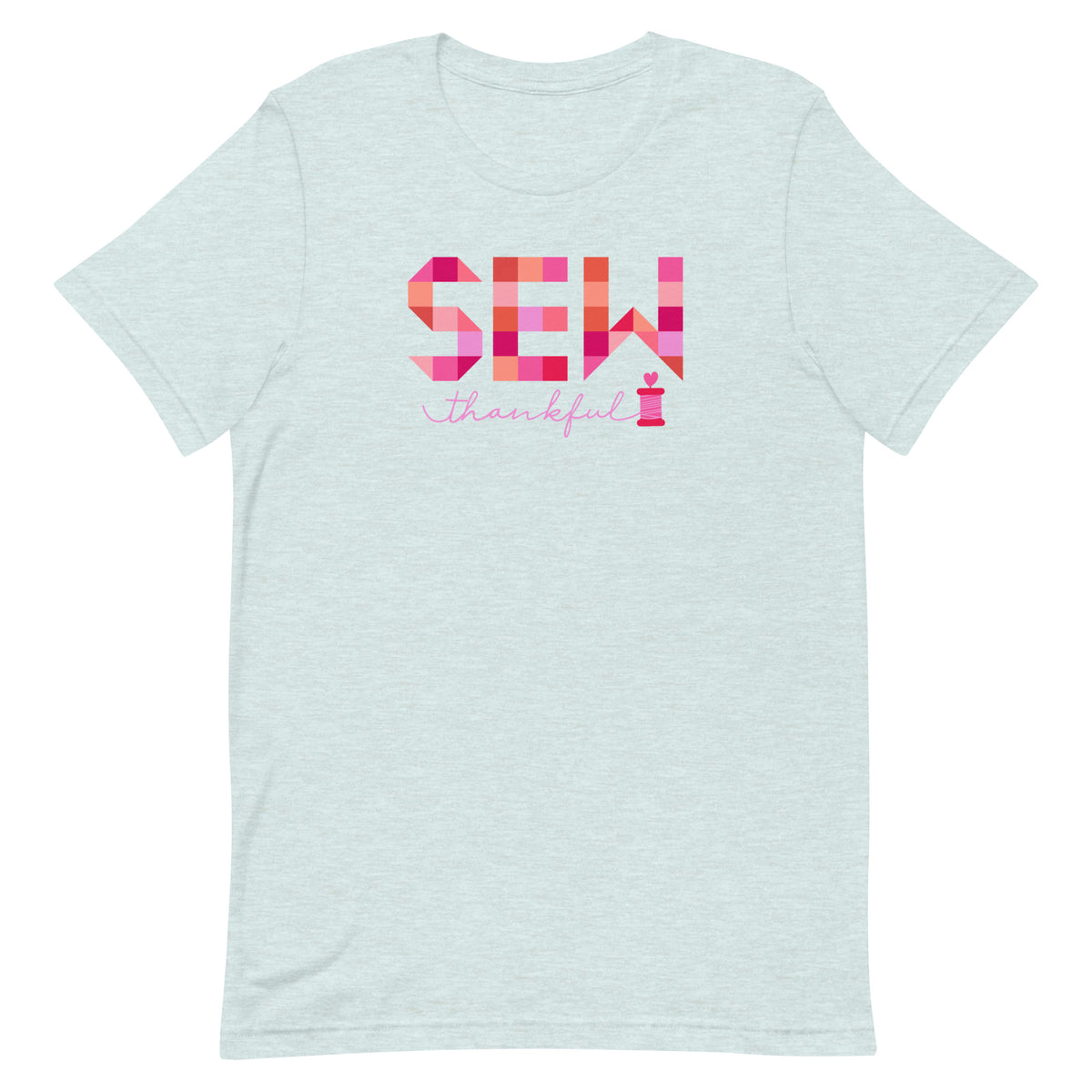 Sew Thankful patchwork lettering with a heart-topped thread spool on a t-shirt in heather prism ice blue, front view – Kate Spain design for Pat Sloan