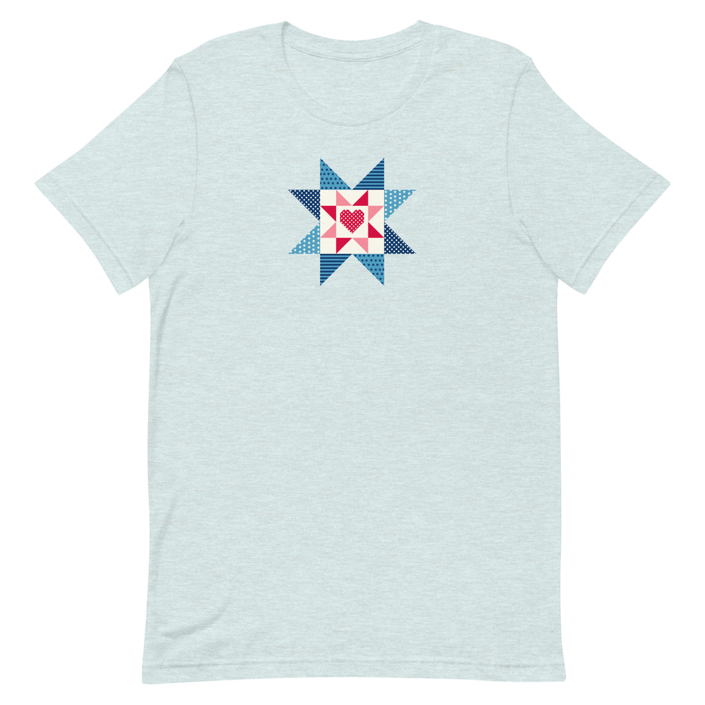 Liberty Love star quilt block with a heart in red, white and blue on a t-shirt in heather prism ice blue, front view – Kate Spain design for Pat Sloan