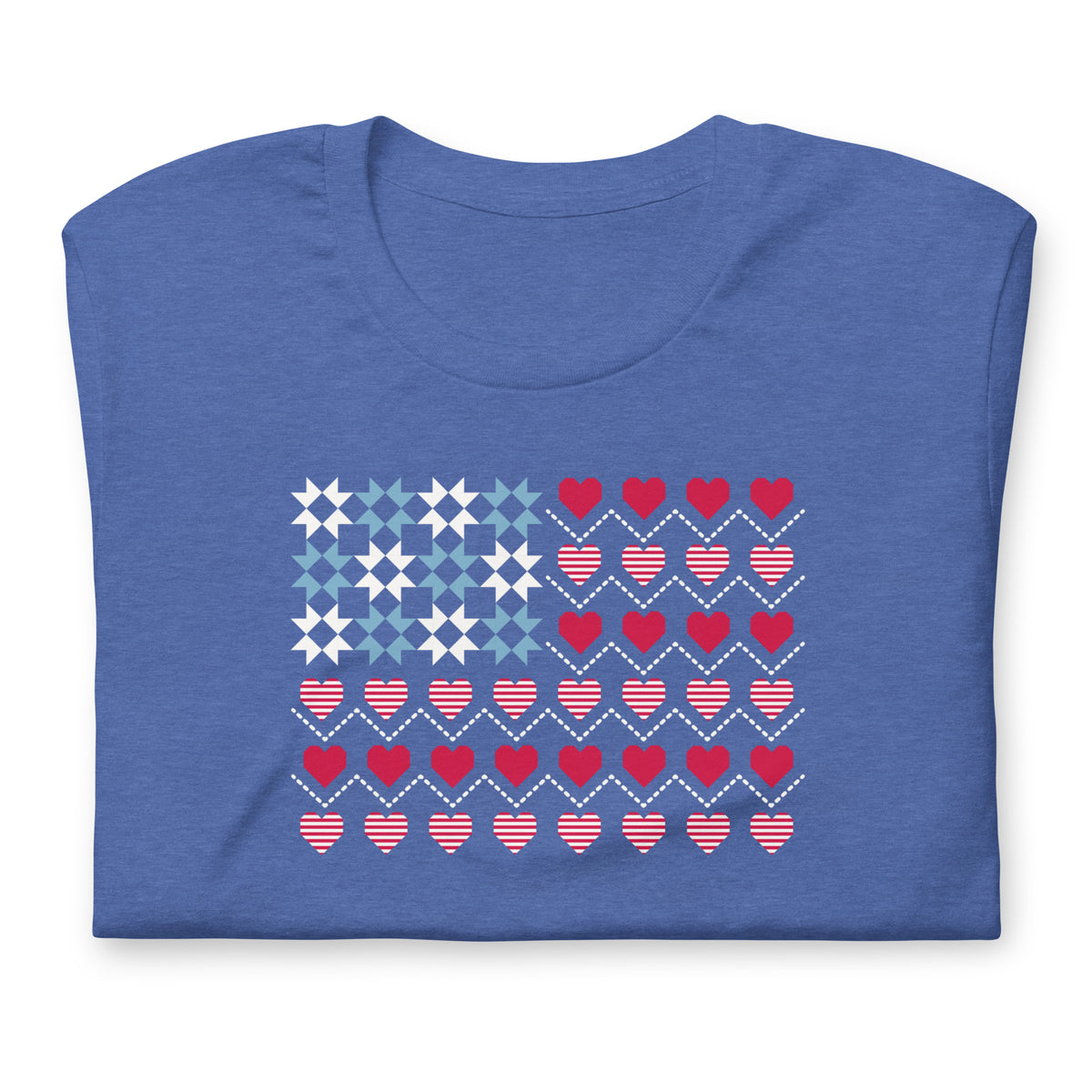 United We Quilt patchwork flag with quilt-block stars and heart stripes on a t-shirt in heather true royal, folded close-up of the design – Kate Spain design for Pat Sloan