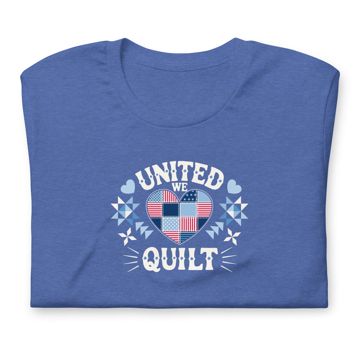 Quilters United quilt badge in red, white and blue on a t-shirt in heather true royal, folded close-up of the design – Kate Spain design for Pat Sloan