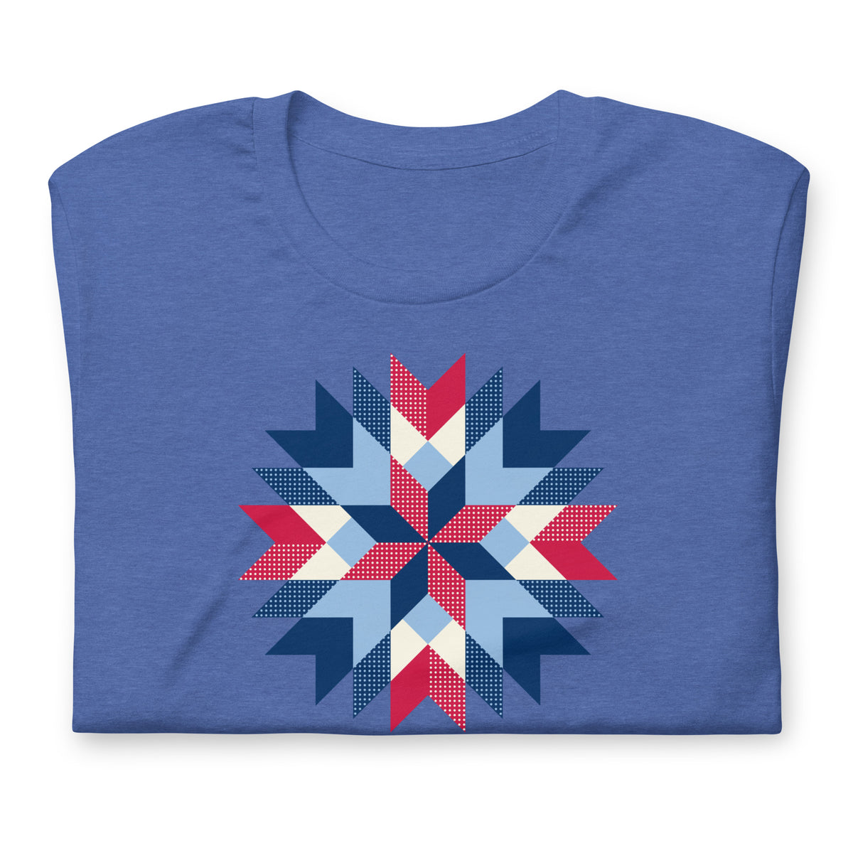 Barn Star quilt block in red, white and blue on a staple t-shirt in heather true royal blue, folded close-up of the design – Kate Spain design for Pat Sloan