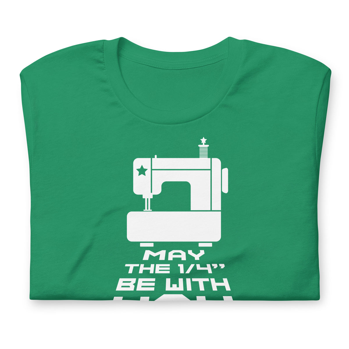 May the ¼" Be With You white sewing machine graphic on a staple t-shirt in kelly green, folded close-up of the design – Kate Spain design for Pat Sloan