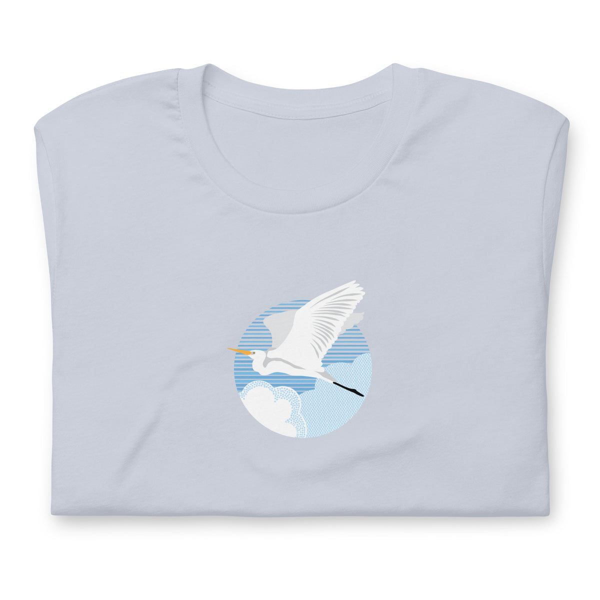 Great egret in flight against a blue circle on a t-shirt in light blue, folded close-up of the design – Kate Spain design